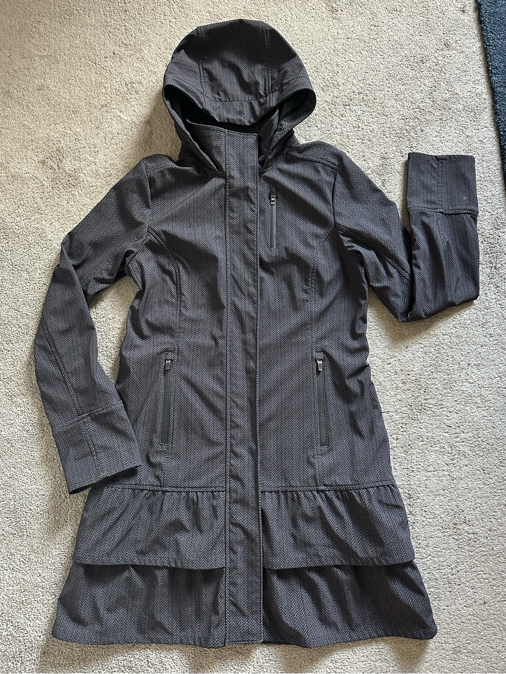 Athleta Shelter Cove Rain Jacket Sz Medium Black and Gray Ruffle Hem Long Coat